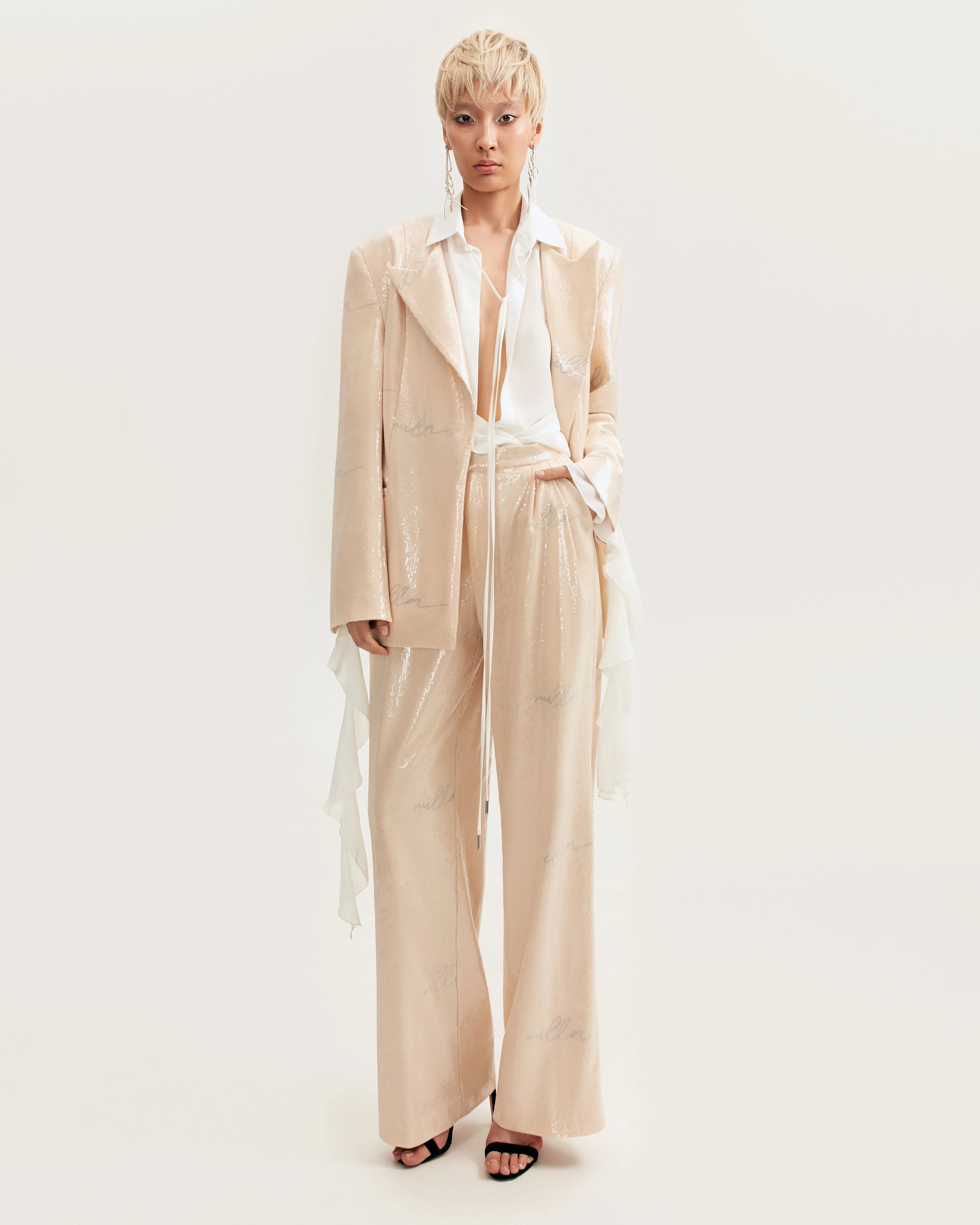 Sparkling beige trousers with Milla's signature, Xo Xo - Image 6